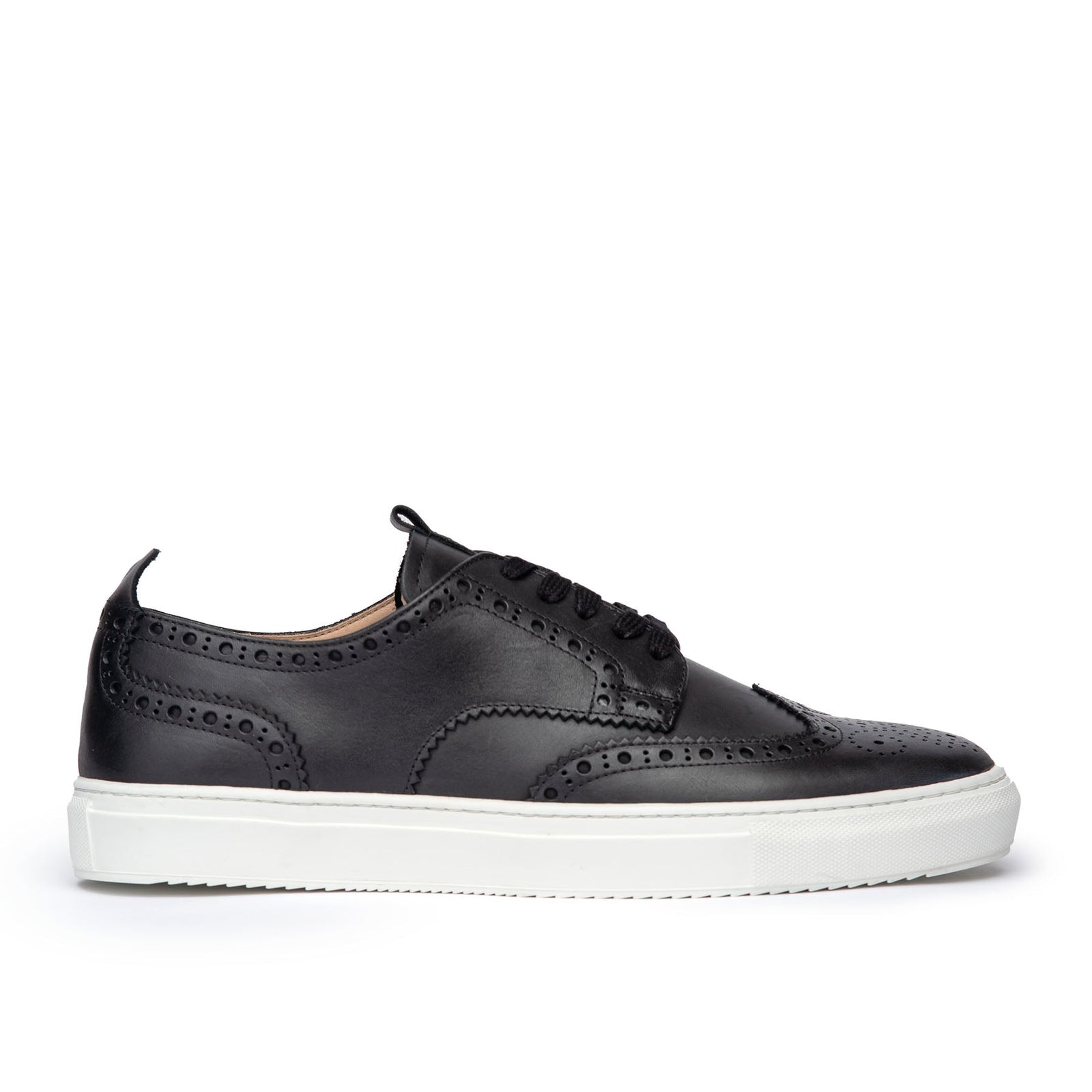 The Alpha full brogue low top sneakers in black leather featuring pull tabs and front lace.