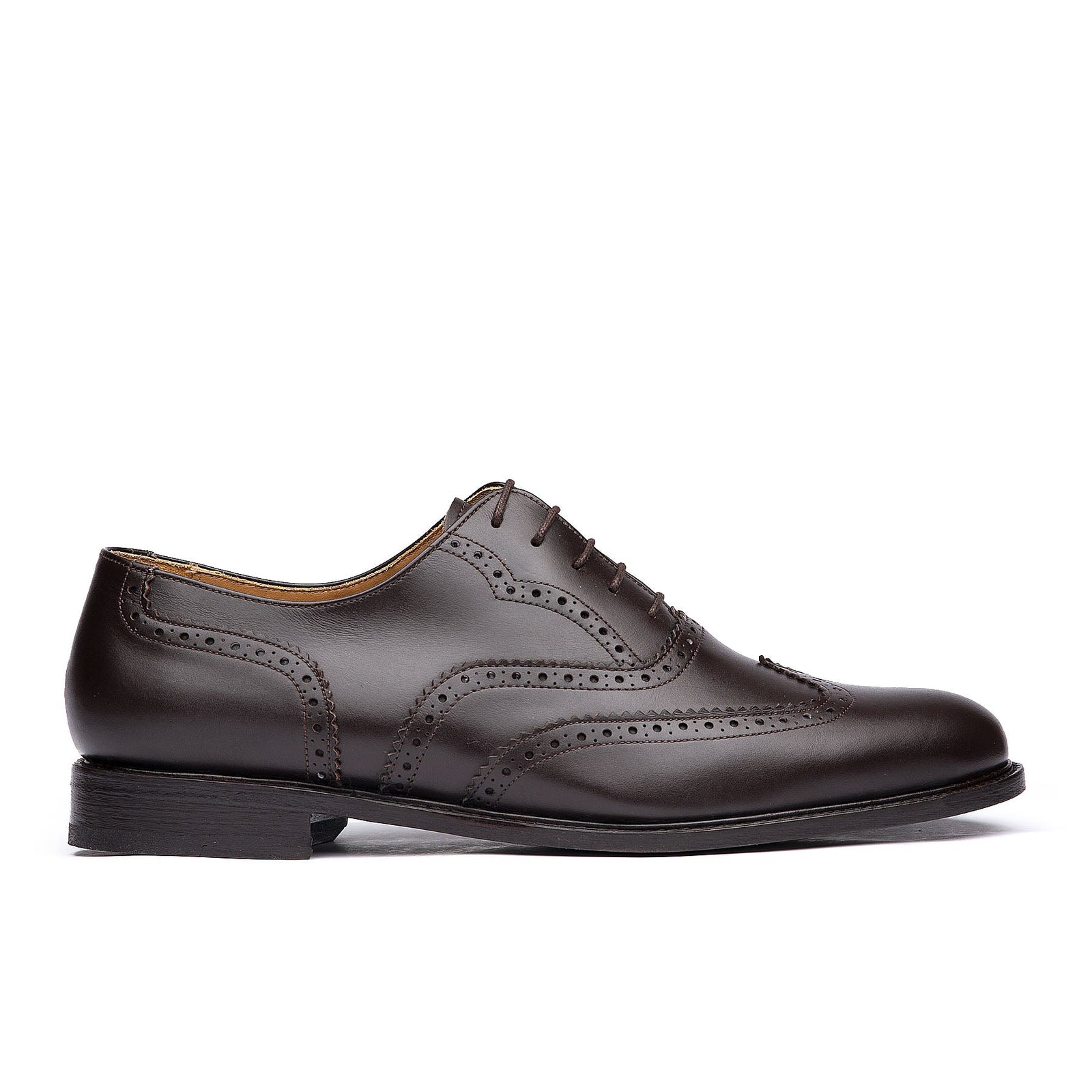 Men's brown wingtip shoes with brogues and leather sole for both formal and casual wear