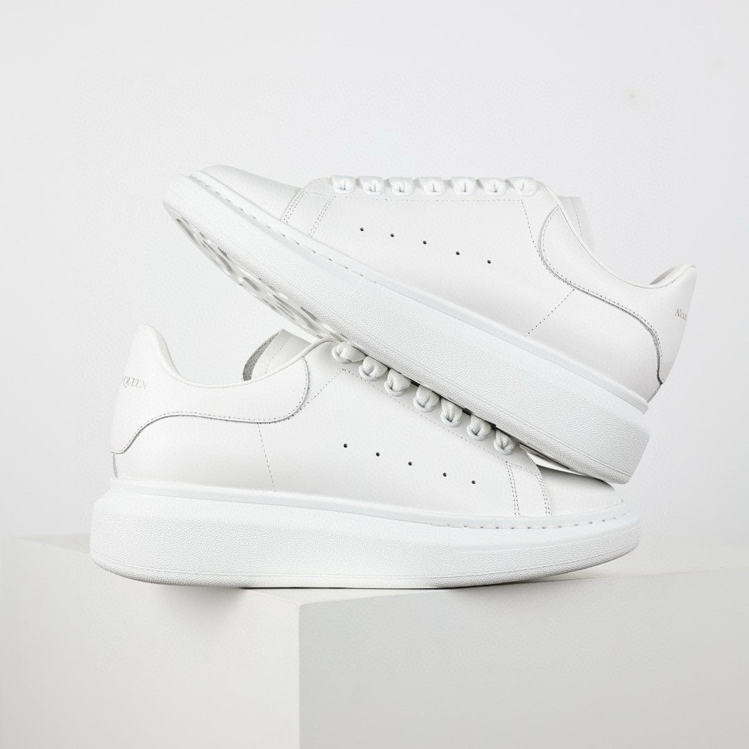 ** Alexander McQueen White Calfskin Sneakers - Authentic Lace-Up Sneakers

**
