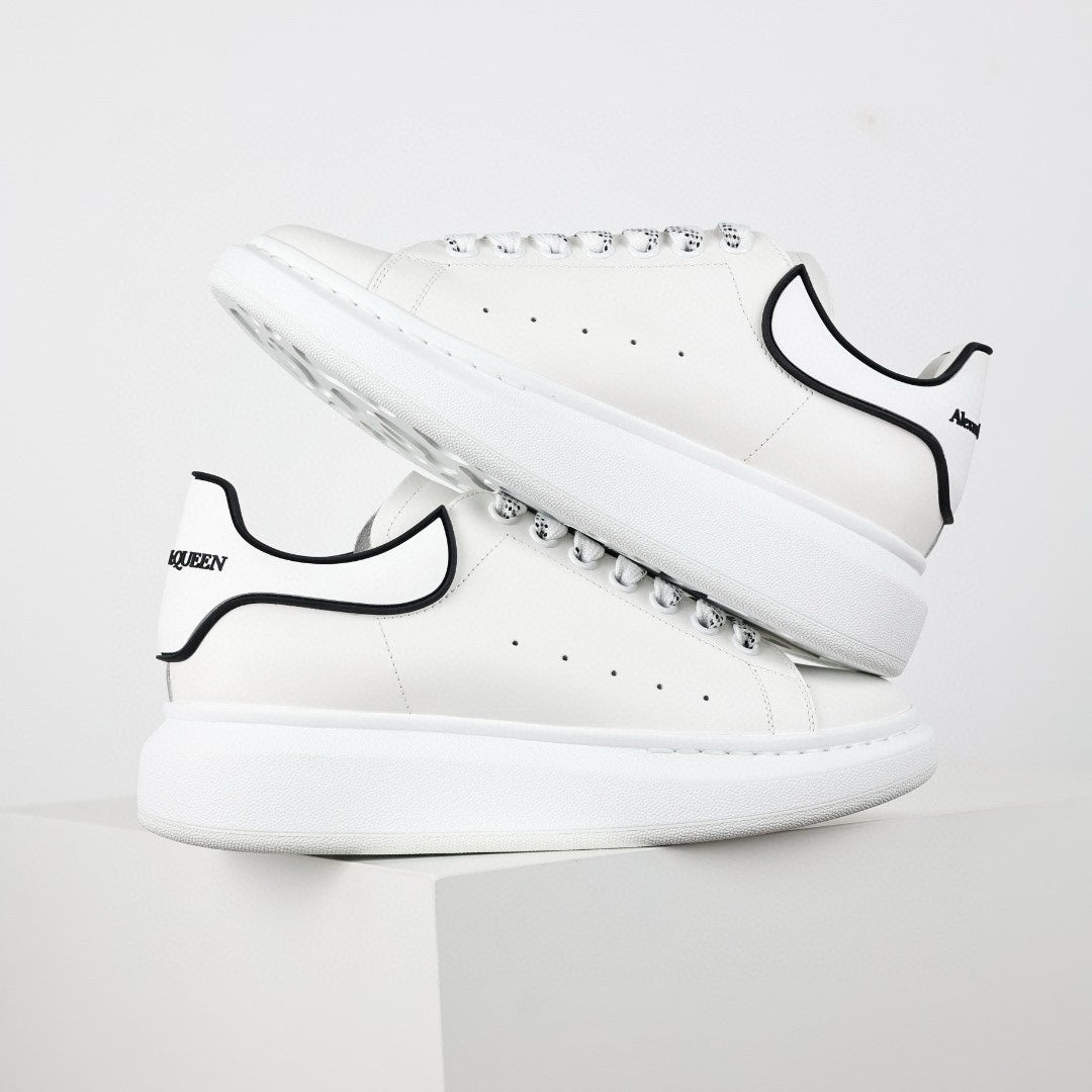 ** Alexander McQueen White Calfskin Sneakers - Authentic Lace-Up Sneakers

**