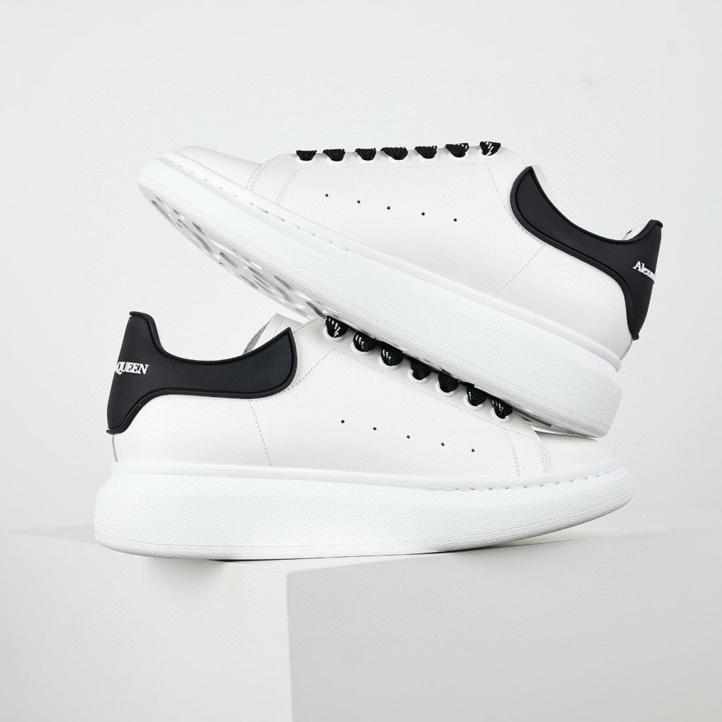 ** Alexander McQueen White Calfskin Sneakers - Authentic Lace-Up Sneakers

**