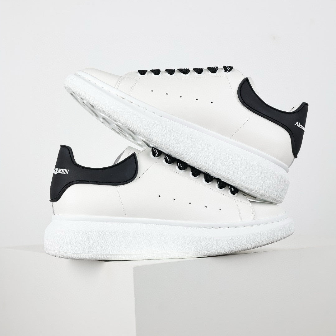 ** Alexander McQueen White Calfskin Sneakers - Authentic Lace-Up Sneakers

**