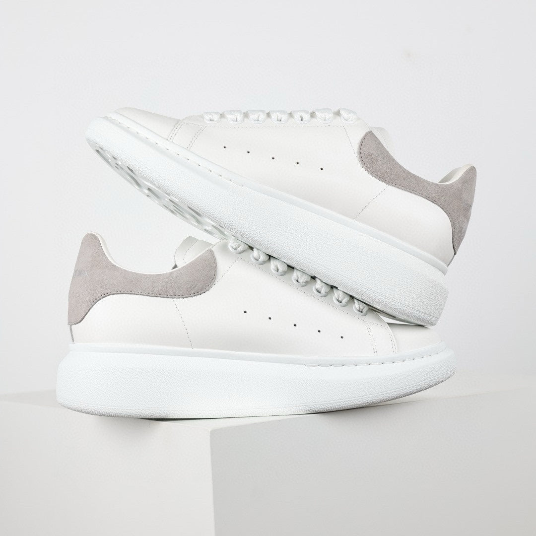 ** Alexander McQueen White Calfskin Sneakers - Authentic Lace-Up Sneakers

**
