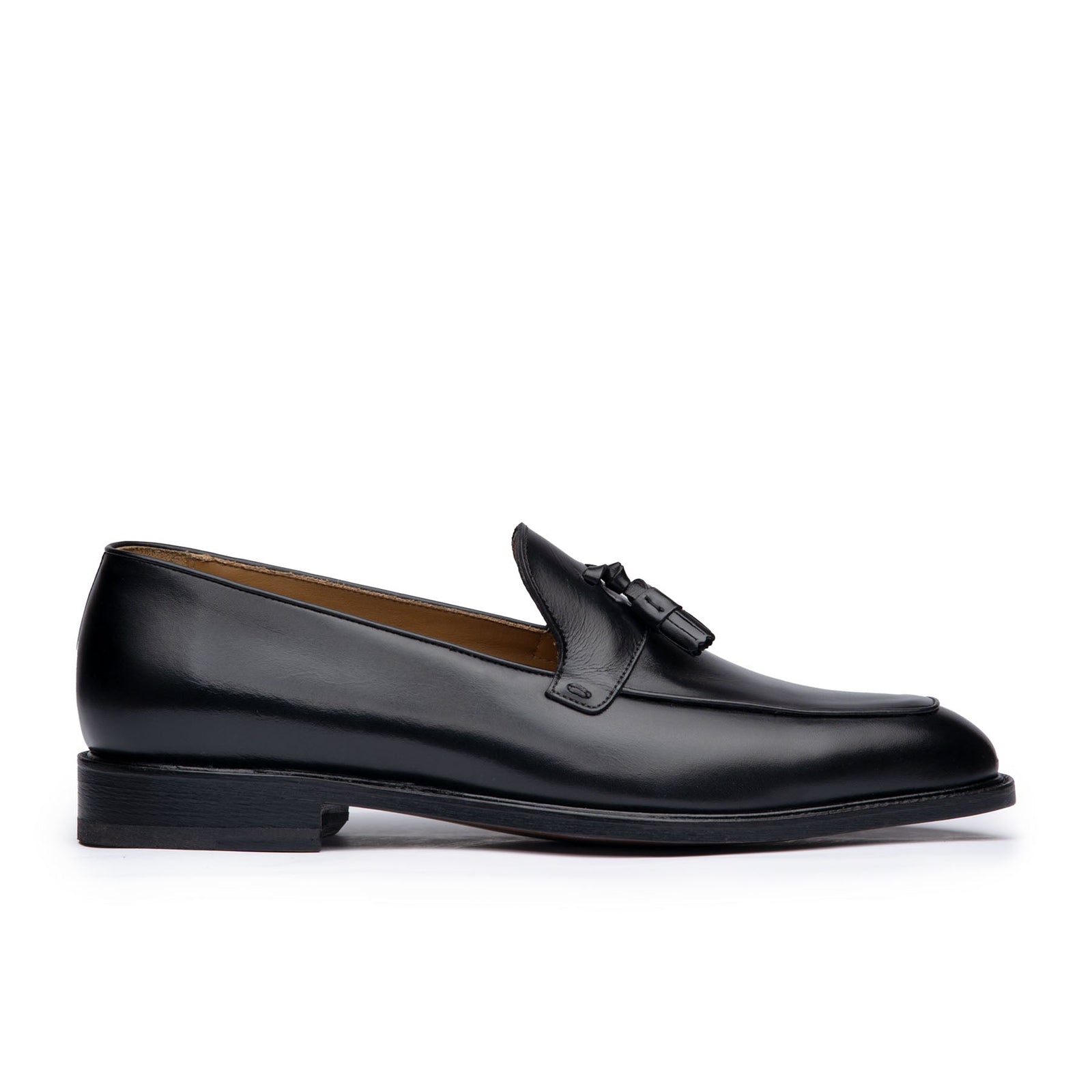 Mens tassel loafers in black full grain calfskin leather with suede finish at the heel cap