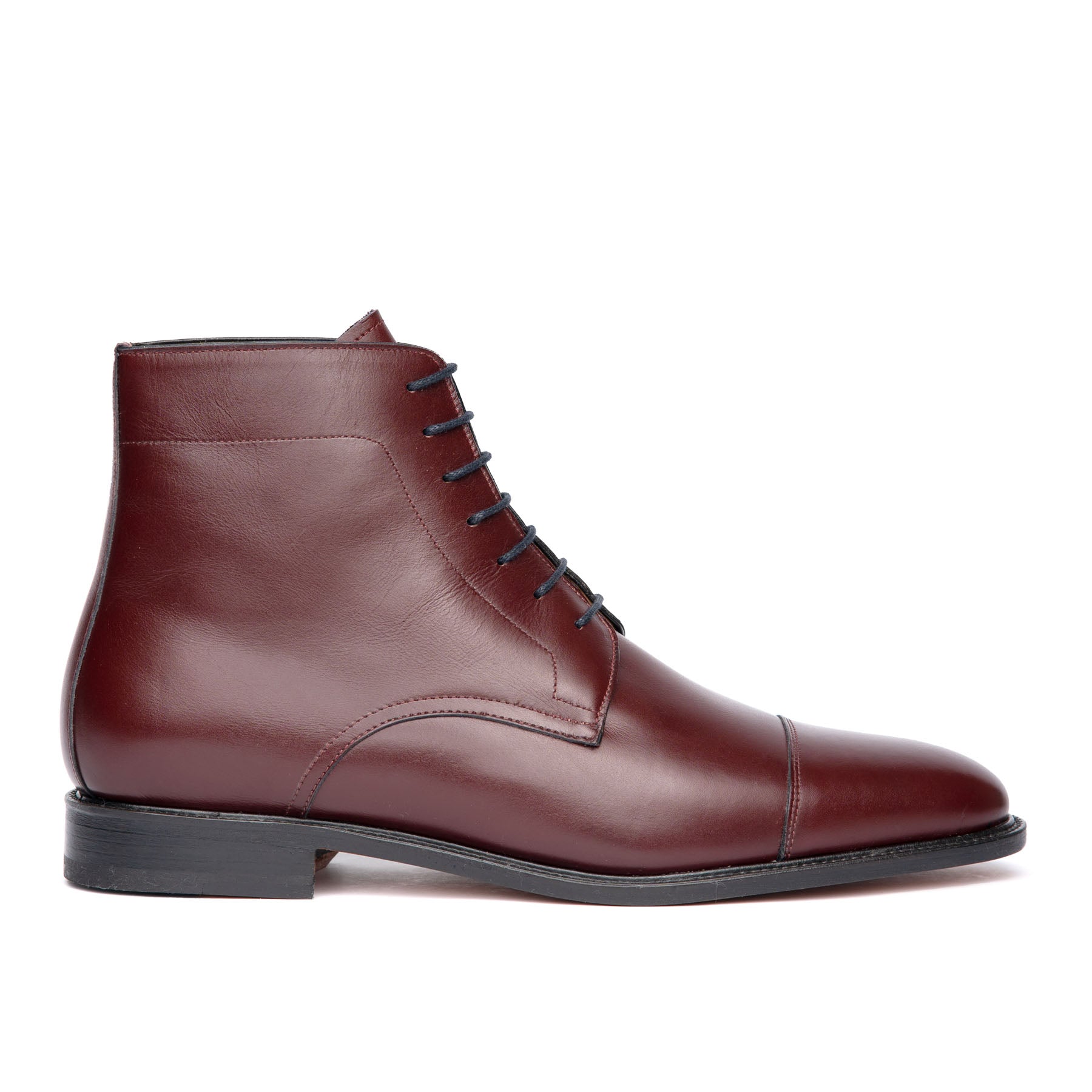 Mens oxblood boots made using full grain calfskin leather with welted construction
