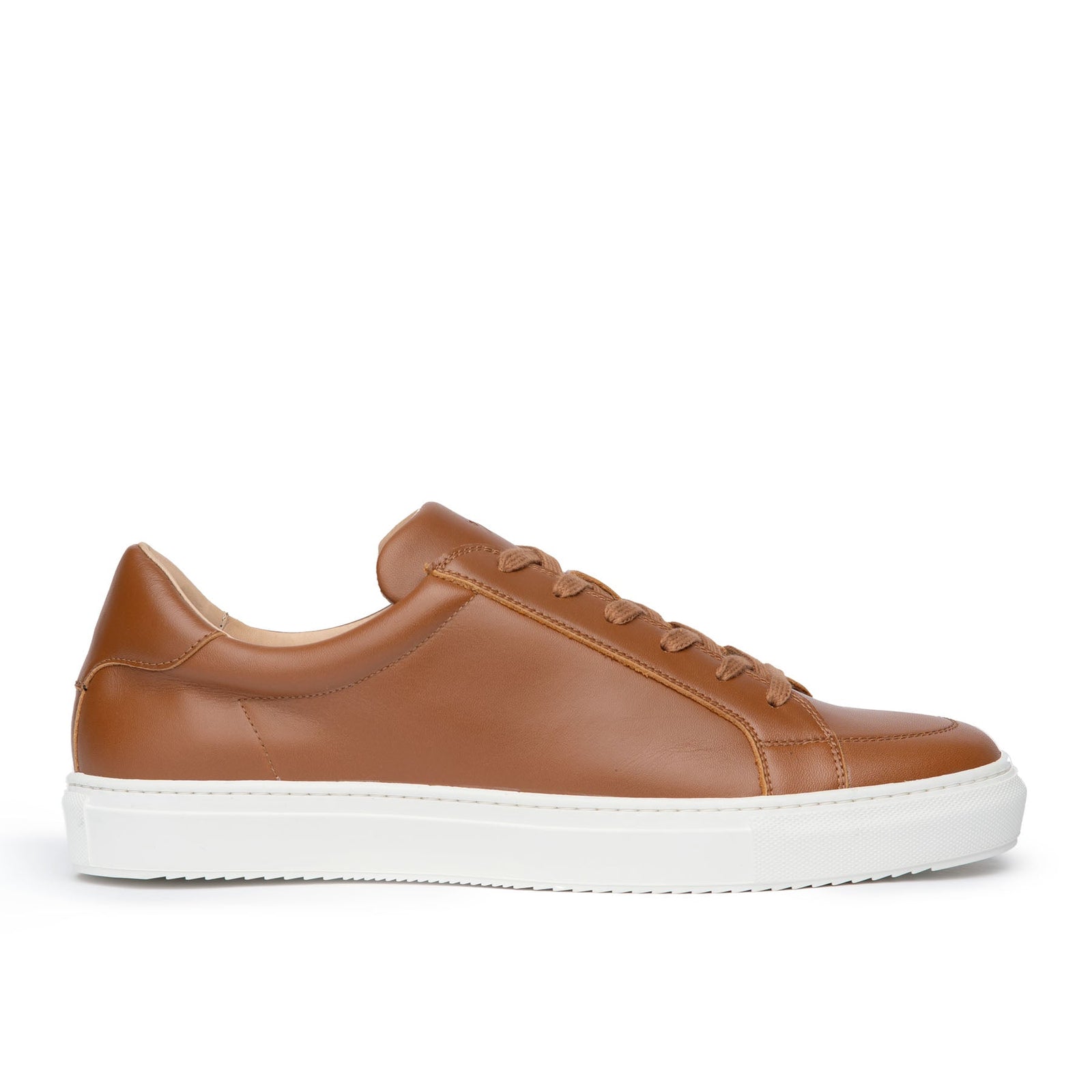 Tan leather sneaker is the best minimalist travel shoes for both men  and women.